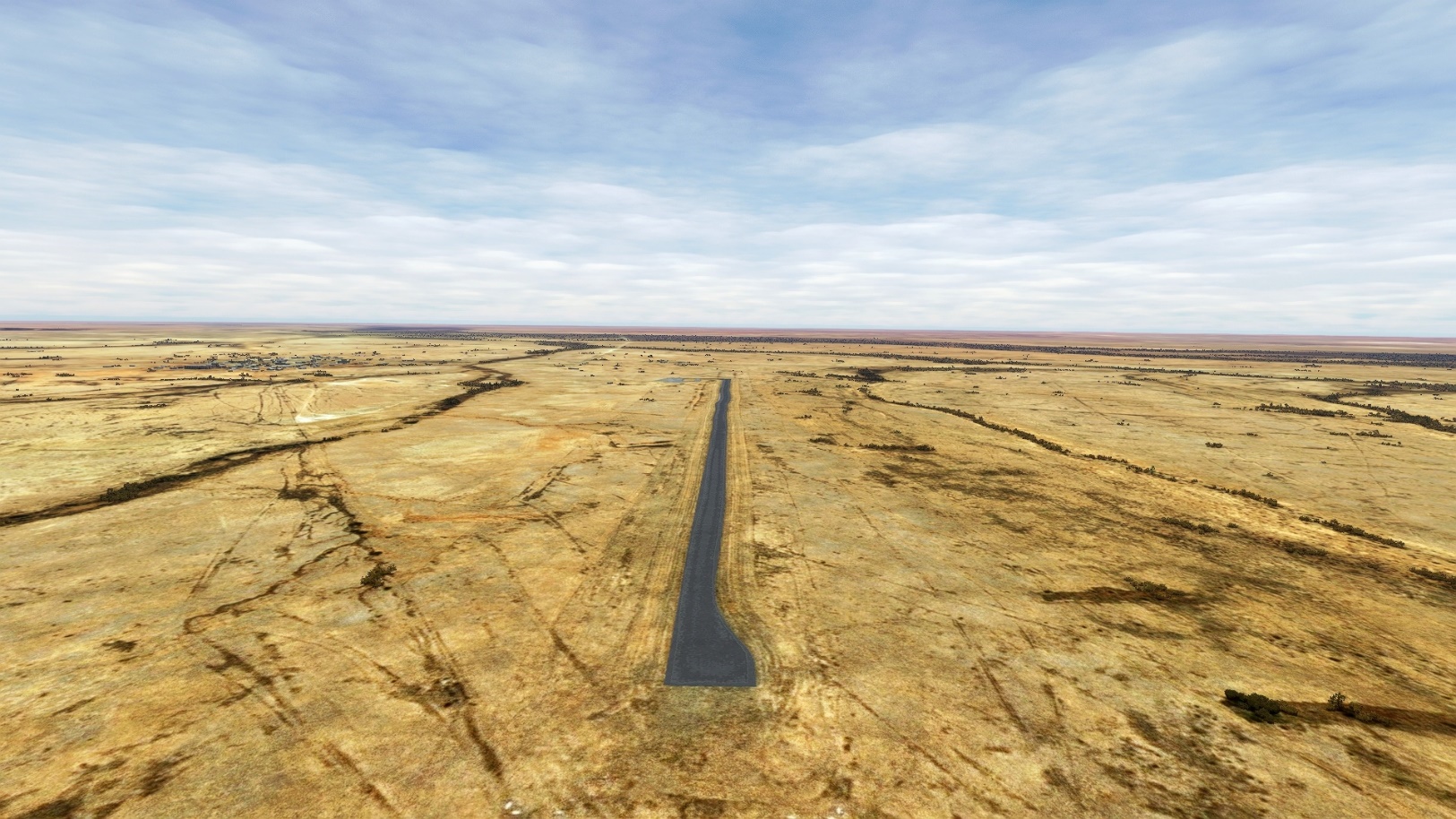 A long straight road in a dry landscape

Description automatically generated